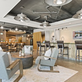 Clubroom Clubroom featuring a lounge area and kitchen with modern furnishings and decor